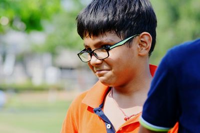 Close-up of boy wearing eyeglasses