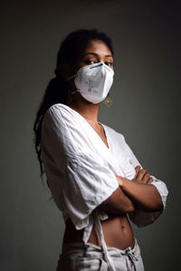 Young woman with a face mask