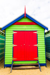 View of multi colored huts on a building