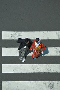 High angle view of men on road