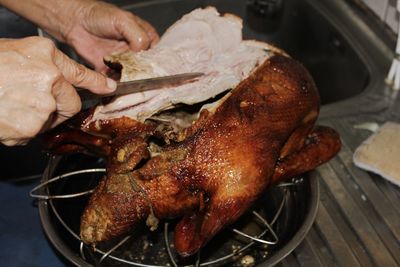 Close-up of person preparing food