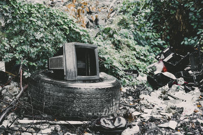 High angle view of old abandoned house in yard