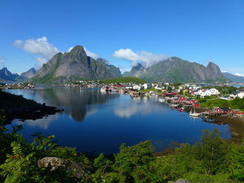 Scenic view of mountains against blue sky