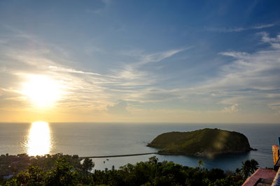 Scenic view of sea against sky at sunset