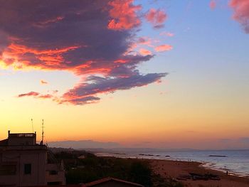 Scenic view of sea at sunset