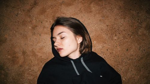 Close-up of girl with eyes closed