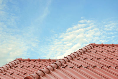 Low angle view of roof against sky