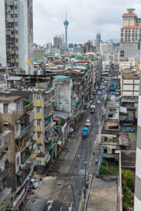 High angle view of street amidst buildings in city