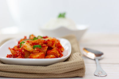 Close-up of food in plate on table