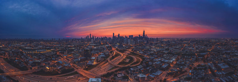 High angle view of city against sky during sunset