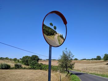 Bicycle against clear blue sky