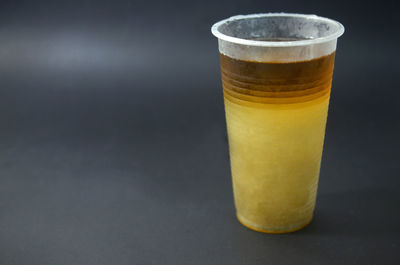 Close-up of beer glass on table