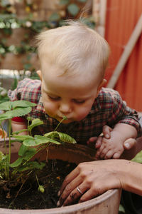 Close-up of cute baby boy outdoors