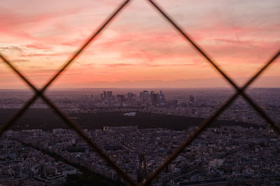 Aerial view of city buildings during sunset