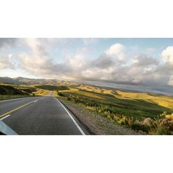 Country road passing through landscape