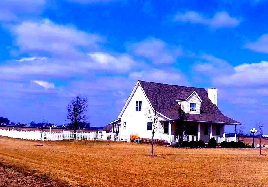 building exterior, architecture, built structure, sky, house, blue, cloud - sky, cloud, beach, field, residential structure, nature, cloudy, tranquil scene, day, outdoors, grass, landscape, sand, tranquility