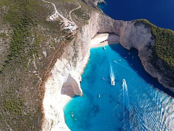 High angle view of mountains against sea