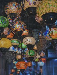 Multi colored decorated for sale at market stall
