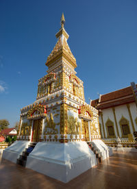 Low angle view of building against blue sky