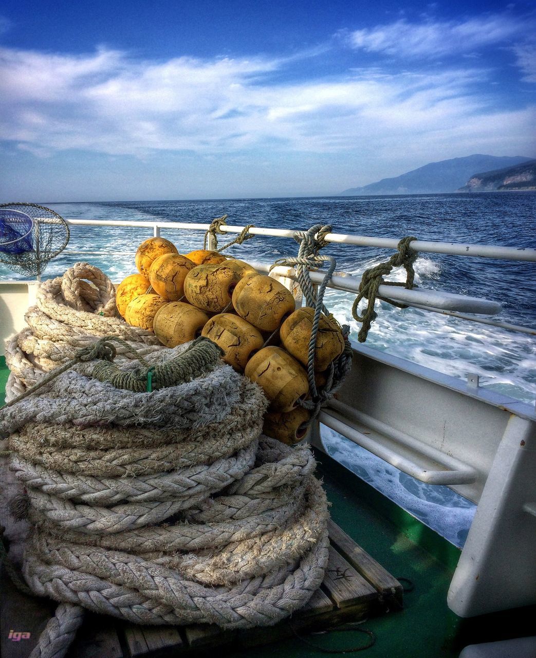 sea, sky, water, cloud - sky, tranquility, tranquil scene, nautical vessel, cloud, beach, nature, horizon over water, beauty in nature, scenics, transportation, mode of transport, shore, boat, cloudy, rock - object, outdoors