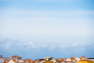 Panoramic view of residential district against sky