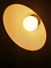 Low angle view of illuminated light bulb