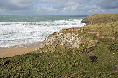 Scenic view of beach against sky