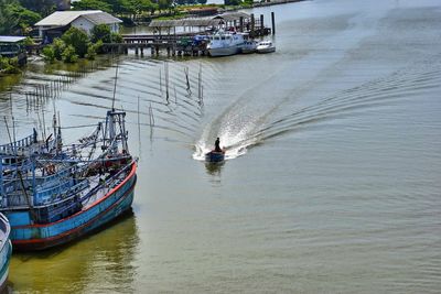 Boats sailing in river