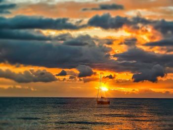 Scenic view of sea at sunset