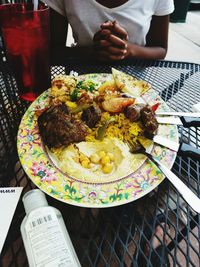 High angle view of people in plate on table