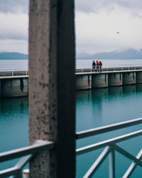 Bridge over river against sky