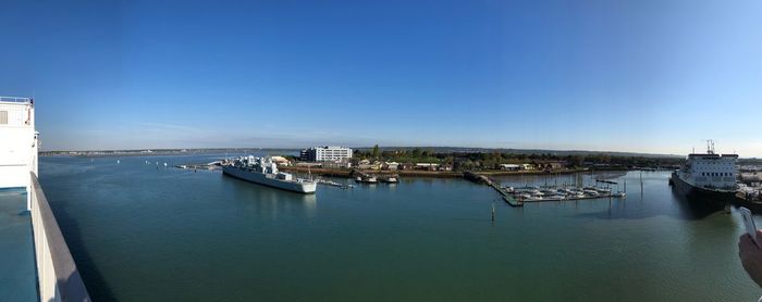 Scenic view of sea against clear blue sky
