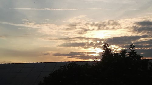 Scenic view of cloudy sky at sunset