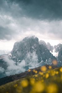 Scenic view of mountains against sky during winter