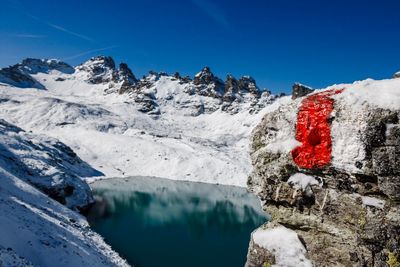 Scenic view of mountains against clear blue sky