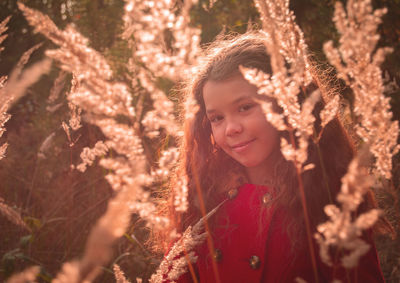 Portrait of girl with plants