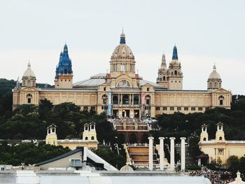 View of buildings in city against sky