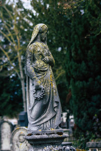 Statue of angel in cemetery