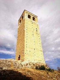 Low angle view of lighthouse against sky