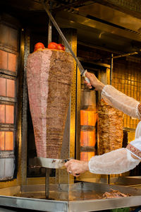 Person working on cutting board