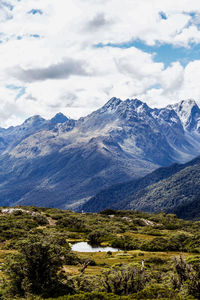 Scenic view of snowcapped mountains against sky