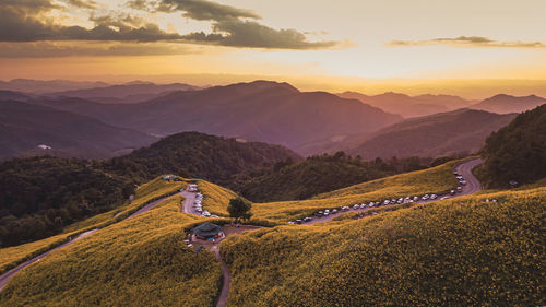 Scenic view of mountains against sky during sunset