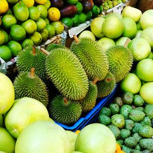 High angle view of various fruits in market for sale