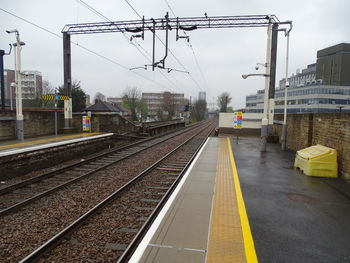 Railroad station platform against sky