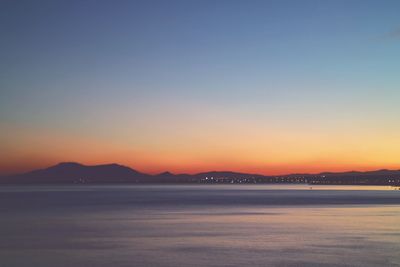 Scenic view of sea at sunset