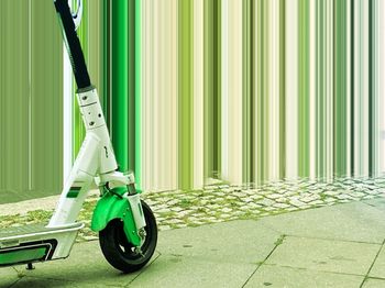 Motorcycle cart against wall