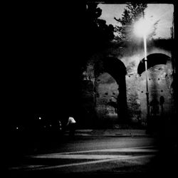 Illuminated street light at night