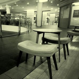 Empty chairs in restaurant