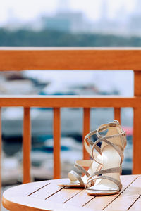 Close-up of chairs and table at restaurant