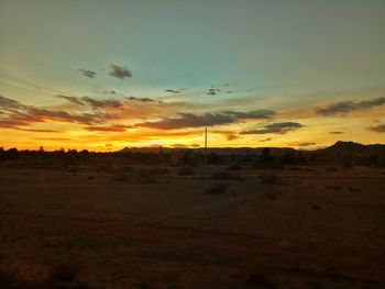 Scenic view of silhouette landscape against sky during sunset